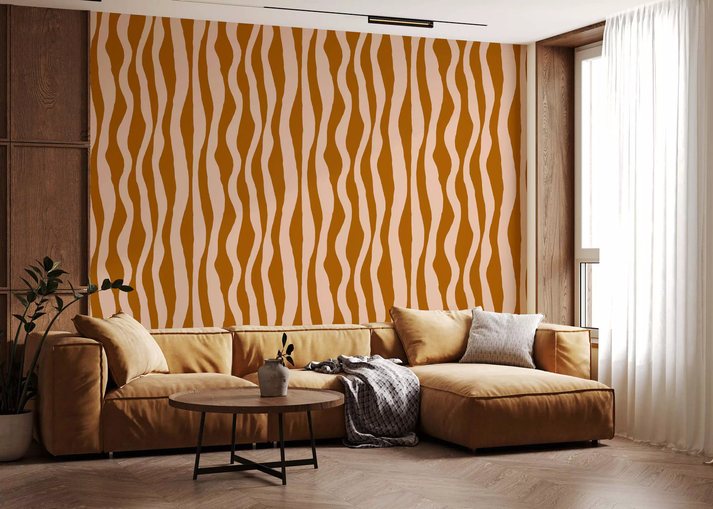 Living room wall covered in soft terracotta and pink wavy stripe pattern wallpaper.