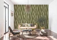 Two tone olive green wavy lines flowing top to bottom across the wallpaper in hallway.