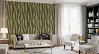 Organic wavy stripe wallpaper with irregular olive curves in retro mood.