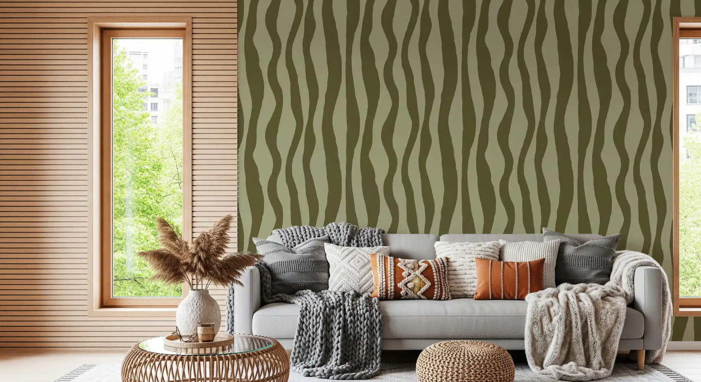 Mid century inspired olive green wavy stripe wallpaper with wide curving bands.