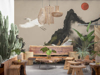 Japanese sumi-e style mural with cranes, layered peaks and red sun in muted earth tones.