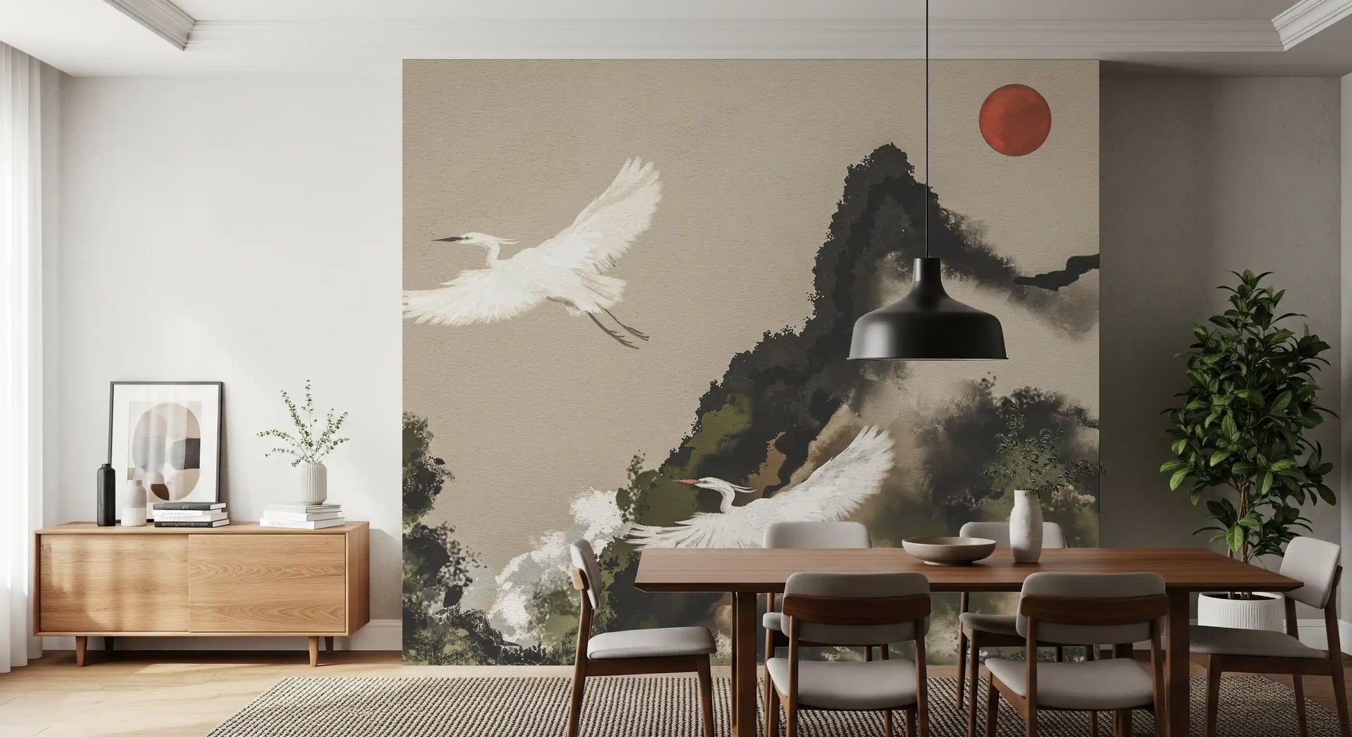 Dining room with ink wash mountain landscape mural in muted earth tones.