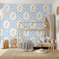 Daisy and goose wallpaper across a toddler bedroom wall.