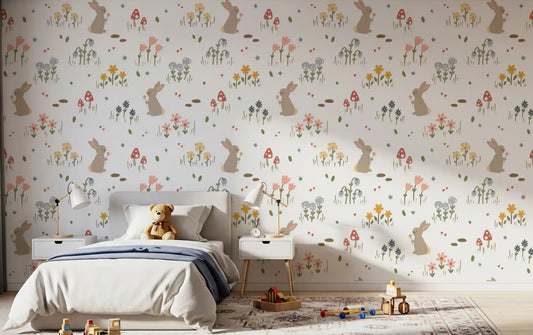 Kids bedroom wallpaper with whimsical bunny motifs and scattered pastel flowers.