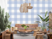 Crisp gingham wallpaper design with overlapping pale blue checks.