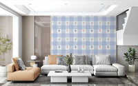 Soft floral gingham wallpaper across a living room wall.