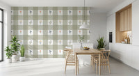 Floral gingham repeat wallpaper in muted sage white coral and dusty blue colour tones.