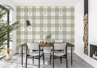 Dining room wall with sage gingham floral repeat wallpaper in white and green check.