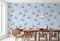White daisy motifs with golden yellow centres on illustrated blue grid wallpaper.