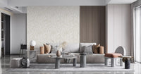 White line art botanical repeat pattern on sandy beige wallpaper for living room.