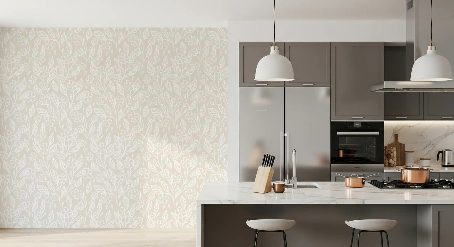 Flowing stem and leaf line art pattern on a beige floral wallpaper in kitchen.