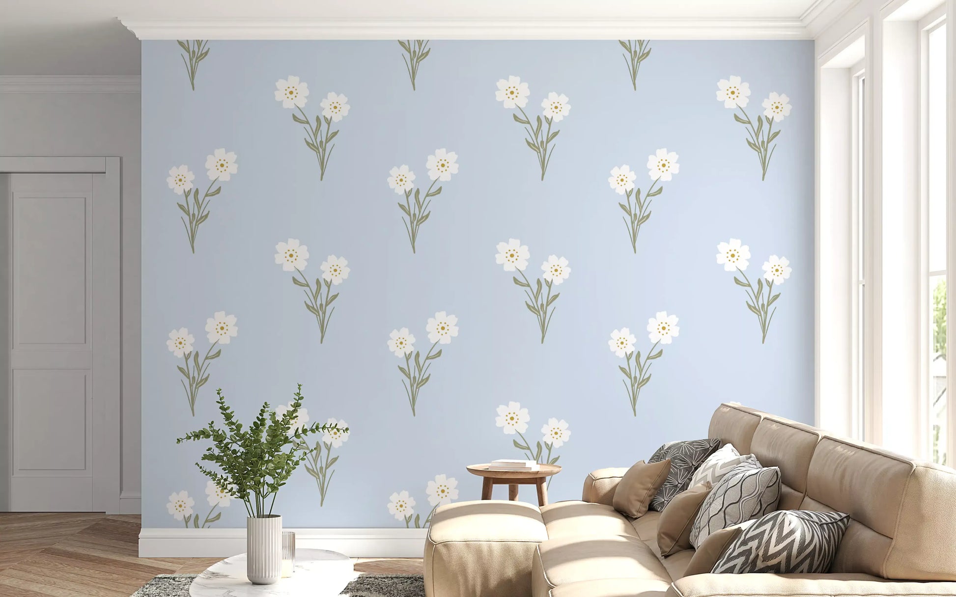Living room feature wall with delicate floral repeat wallpaper in blush and cream.
