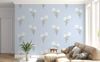 Living room feature wall with delicate floral repeat wallpaper in blush and cream.