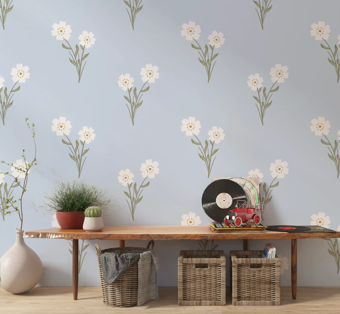 Hallway wall with airy pastel bloom botanical wallpaper in rose and cream tones.
