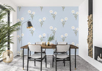 Pastel floral repeat wallpaper featuring rose blush and cream blooms on a light background.
