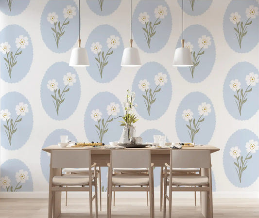 Dining room wall with blue and white scalloped daisy floral wallpaper pattern.
