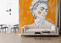 Single-line drawing of woman with knotted updo and hoop earring on orange mural.