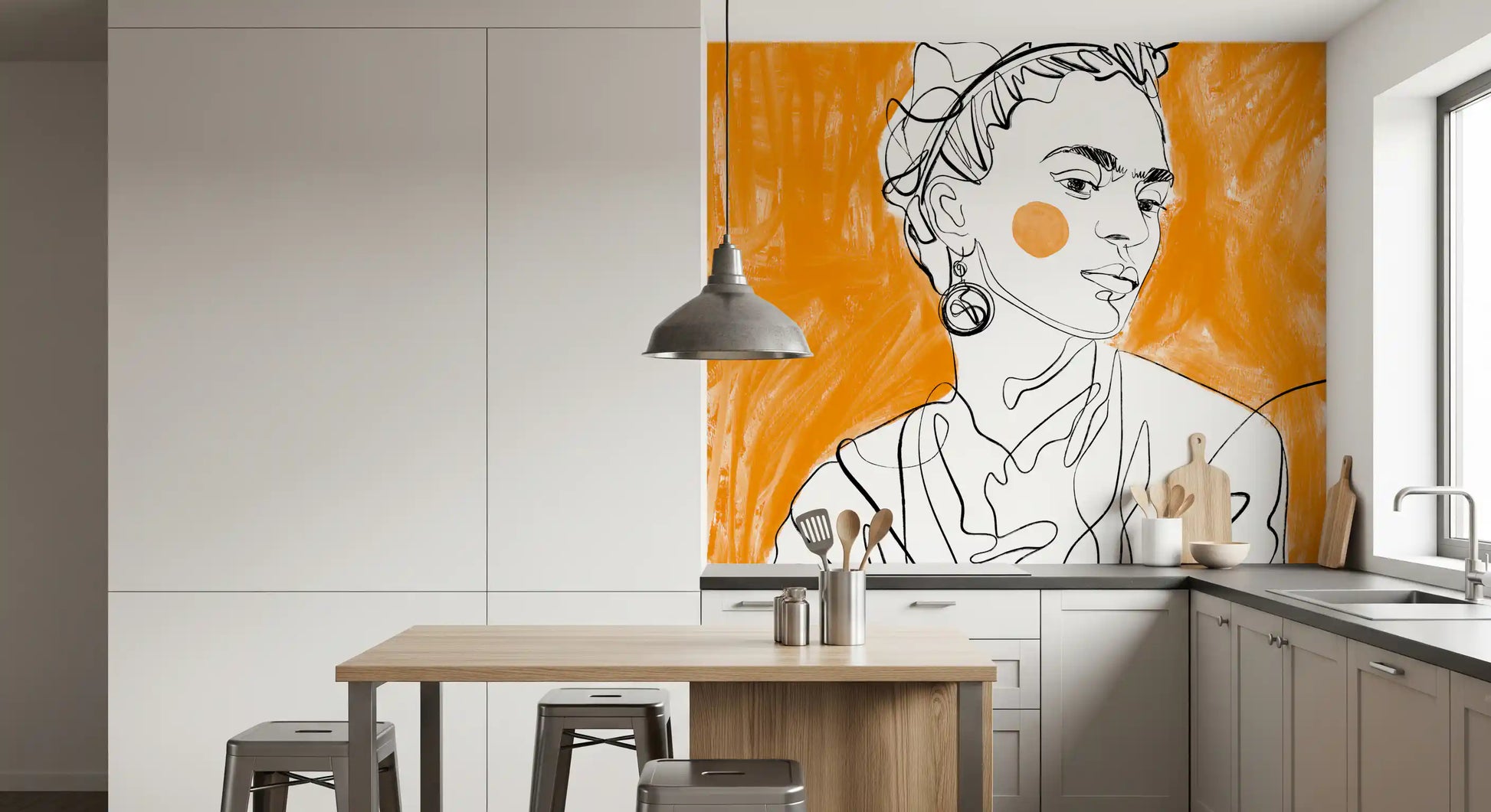 Bold tangerine and black line art portrait on large-scale mural in kitchen.