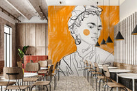 Line art portrait wall mural on a feature wall in a cafe interior.