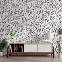 Black and white hand-drawn botanical doodle wallpaper with scattered leaves and small flowers., GD10088