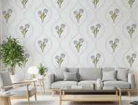 Blue cornflower wallpaper with pastel diamond trellis frames in living room.