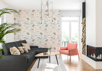 Storybook country wallpaper holding cottages, slate blue tulips, and coral blooms.