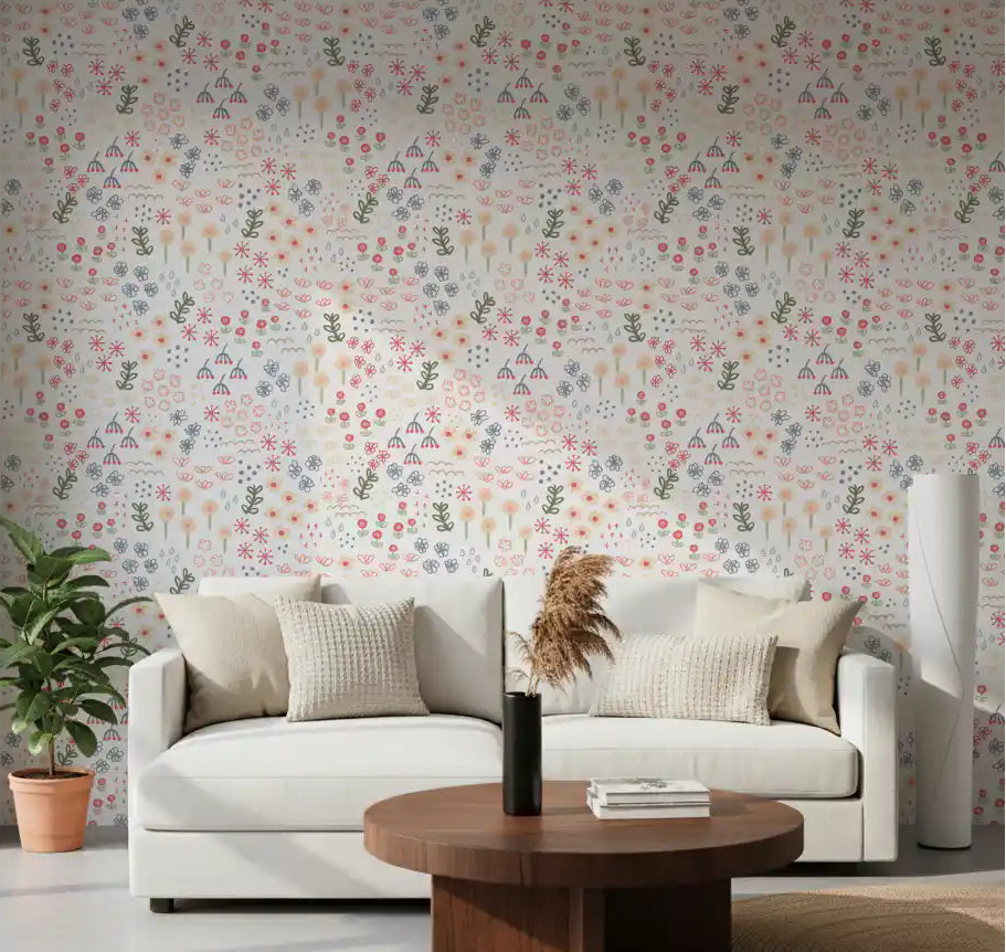 White floral wallpaper with peach coral and blue doodle flower in living room.