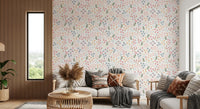 Soft floral wallpaper showing daisies stems and small round dots in living area.