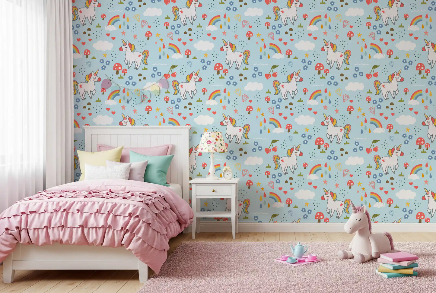 Sky-blue wallpaper featuring smiling unicorns with rainbow manes and tails.