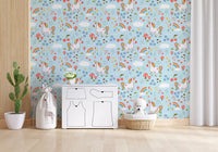 Blue wallpaper with unicorns, mushrooms, daisies and tiny scattered hearts.