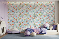Cartoon unicorn wallpaper used as a feature wall in a kids room setting.