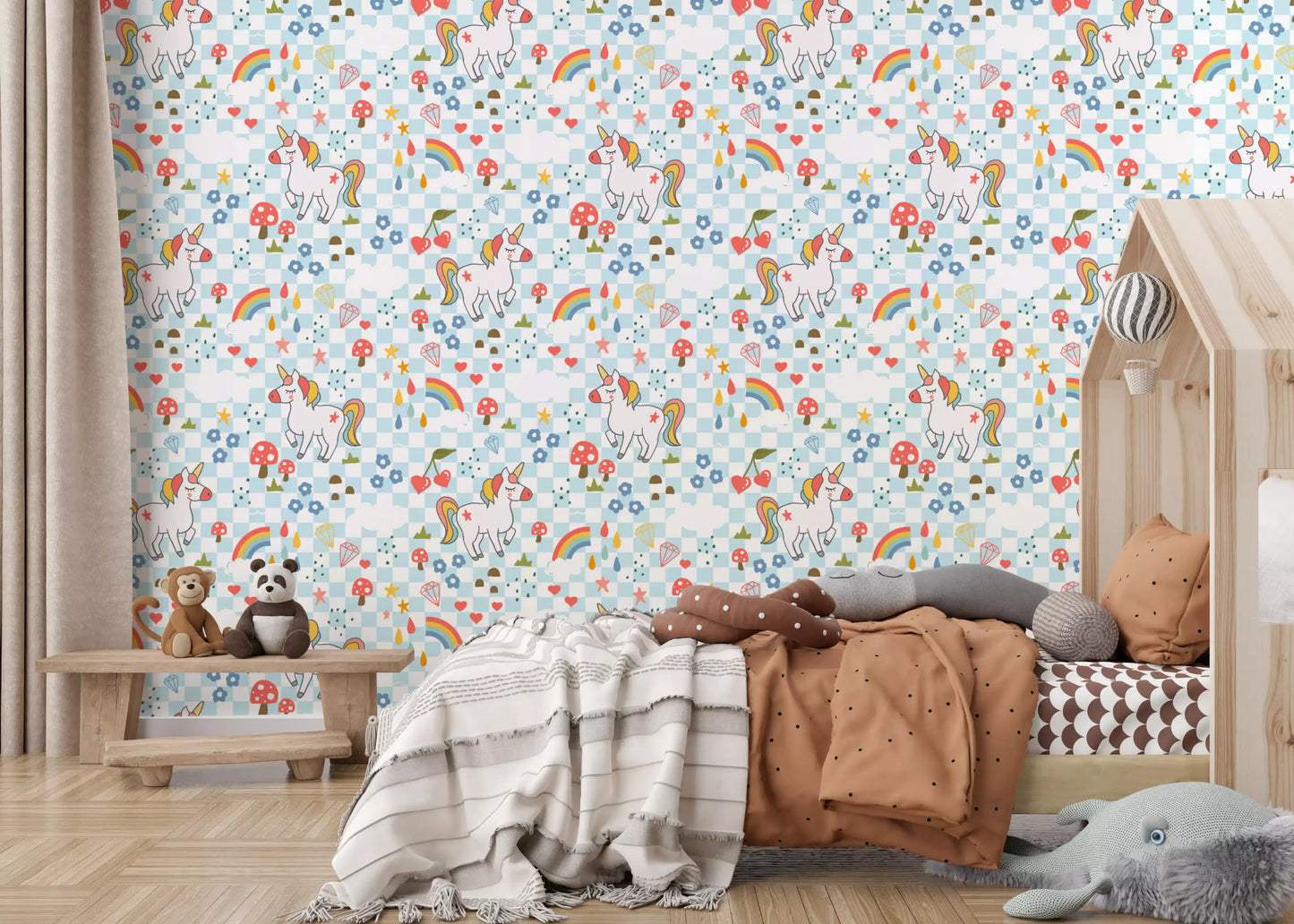 Storybook style wallpaper featuring unicorns, rainbows and floral accents in toddler room.