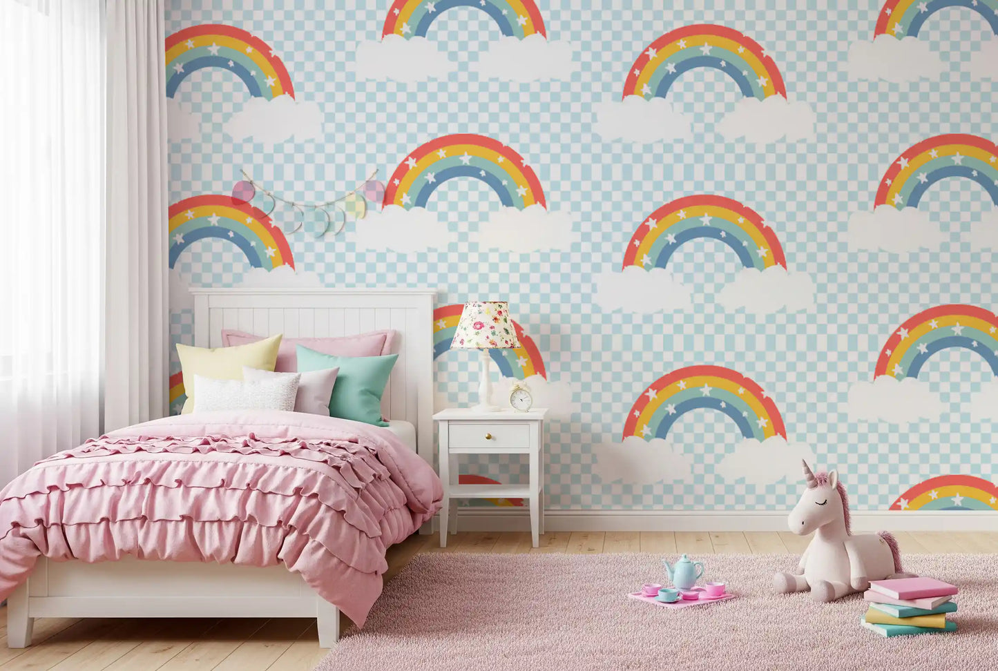 Girls room wall covered in pastel rainbow and starry sky wallpaper.