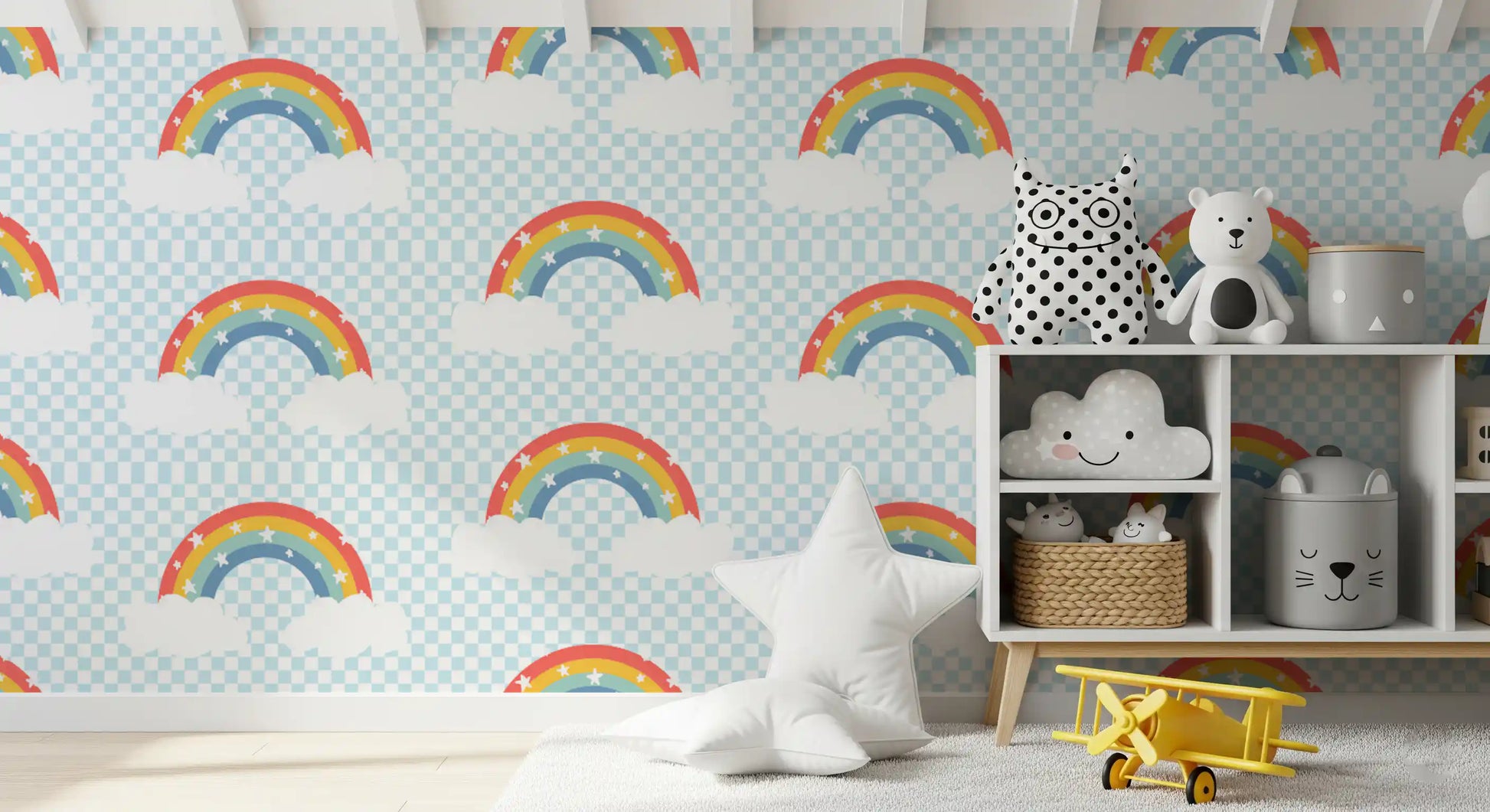 Kids playroom wall with playful rainbow and starry sky wallpaper backdrop