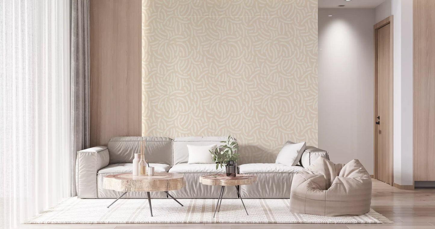 Living room wallpaper featuring cream arc motifs on a soft beige textured backdrop