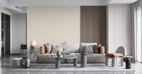 Textured paint wallpaper featuring curved ivory marks on a neutral blush background.