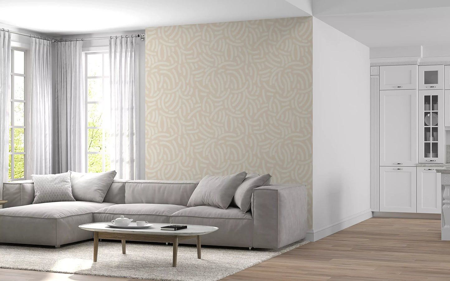 Soft beige wallpaper showing scattered ivory brushstroke marks in a loose pattern.