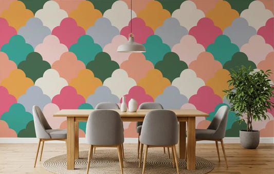 Dining room wall covered in scalloped retro wallpaper with mustard and green tones.