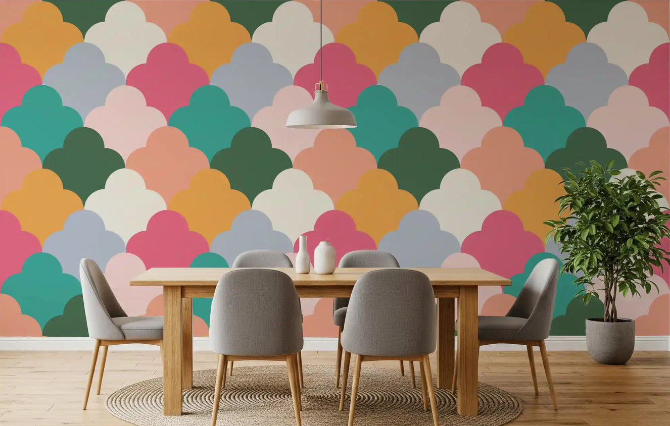Dining room wall covered in scalloped retro wallpaper with mustard and green tones.