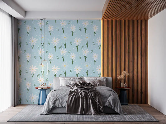 Blue daisy wallpaper featuring white blooms and small scattered leaf accents.