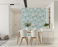 Floral wallpaper with cheerful white daisies on a pale sky-blue background.