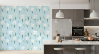 Kitchen wallpaper in sky-blue with white daisies, green leaves, and yellow centre.
