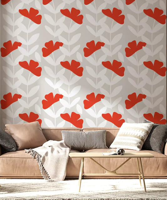 Red peony wallpaper installed in a modern living room with cream walls.