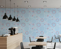 Repeating bubble wallpaper with red outlined circles, white daisies.