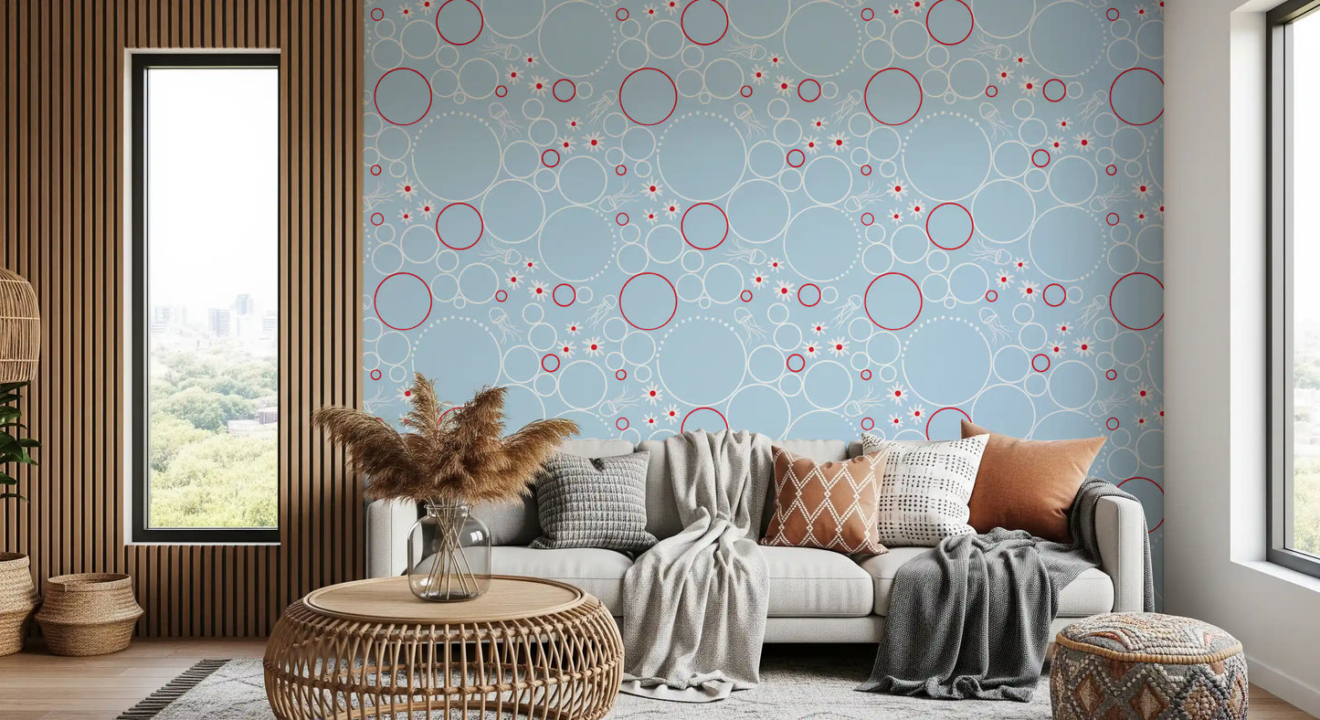 Soft blue jellyfish and bubble wallpaper with daisies and overlapping red circles.