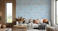 Soft blue jellyfish and bubble wallpaper with daisies and overlapping red circles.