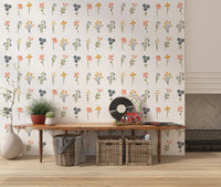 Wildflower wallpaper with mustard, pink, peach and slate blue painted blooms in hallway.