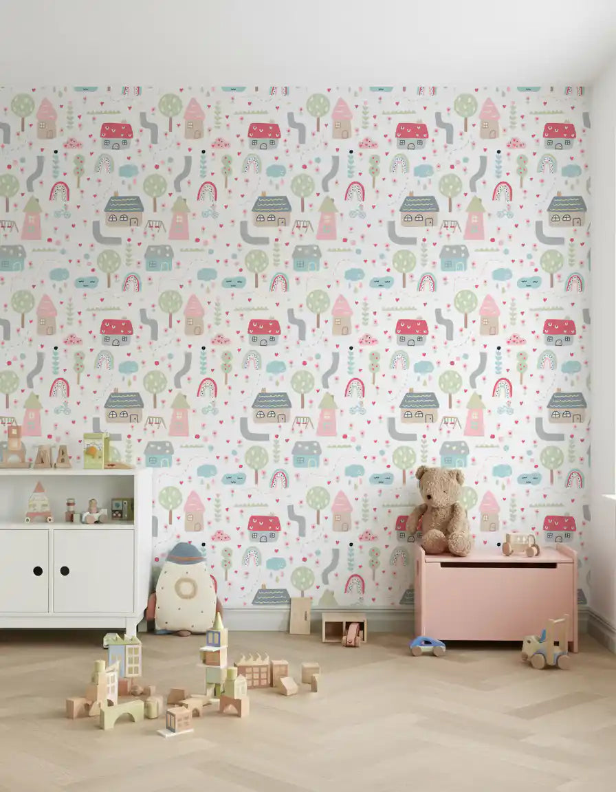 Playroom accent wall showing whimsical village motifs wallpaper in soft pink and sage.