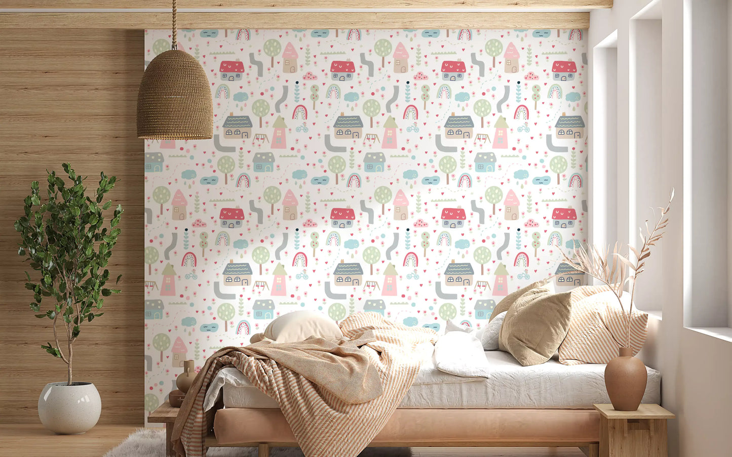 Bedroom feature wall with houses trees rainbows and clouds pattern wallpaper.