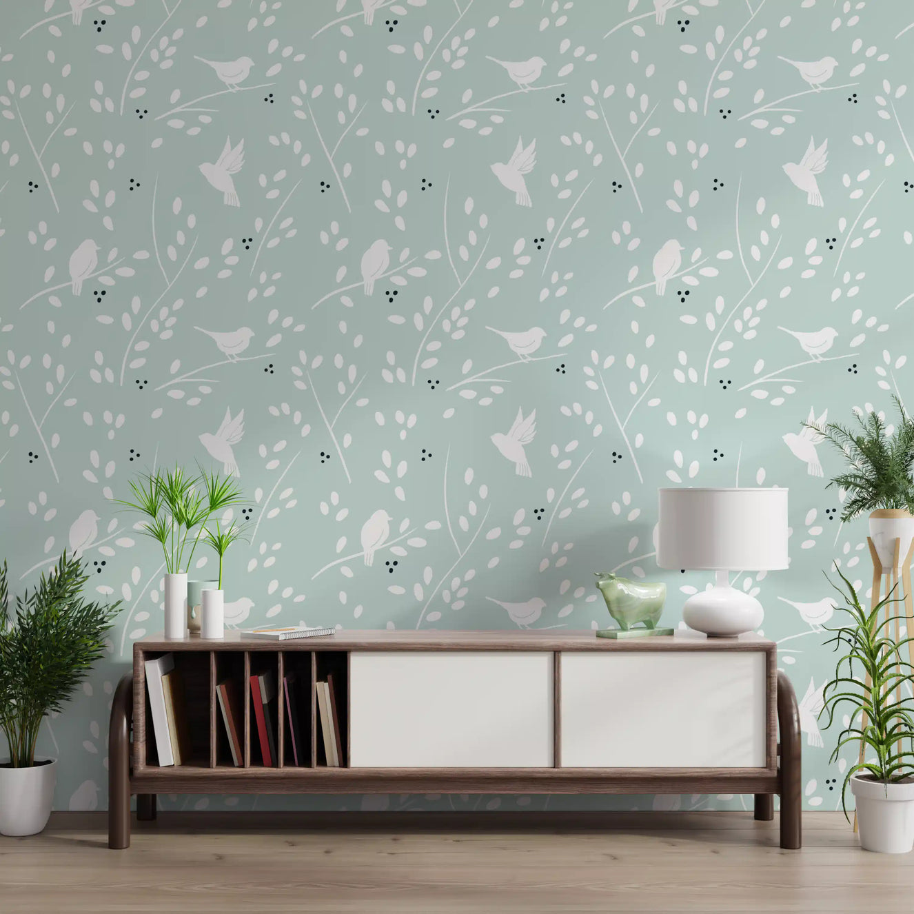 White birds and slender branches on a soft mint-green wallpaper in hallway.